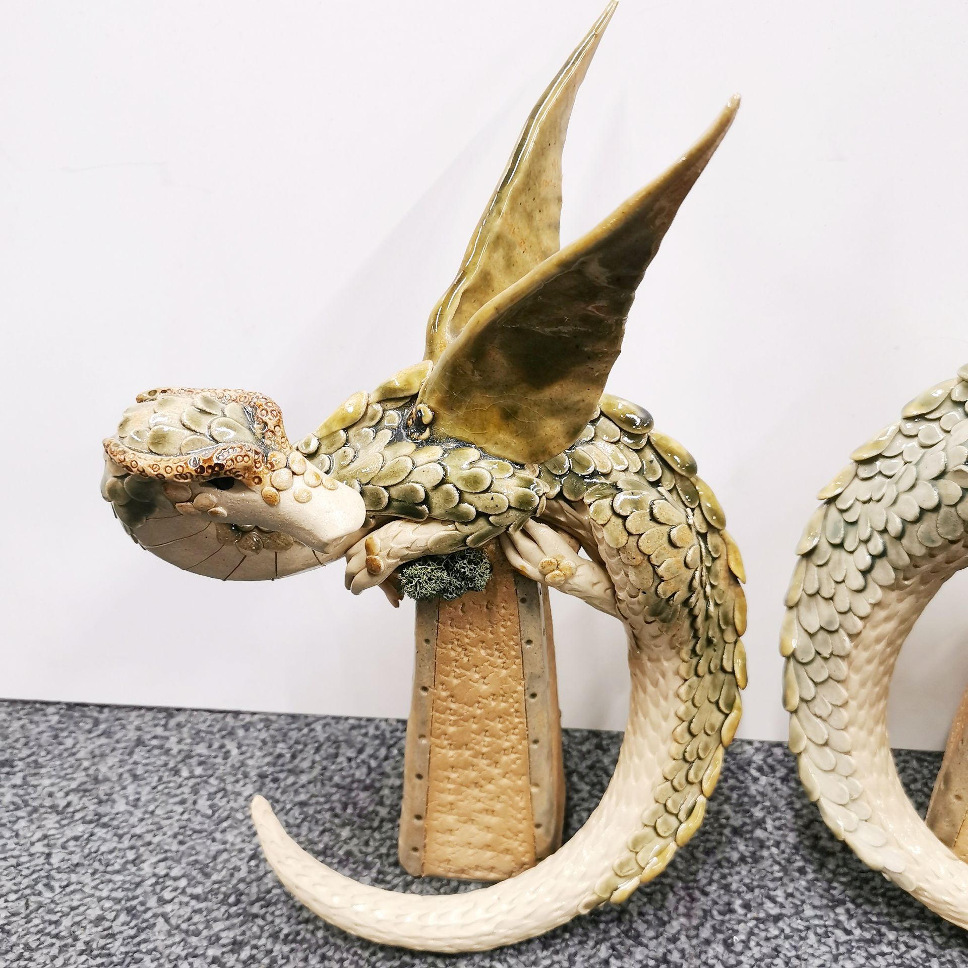 Two glazed pottery figures of dragons by Karen Lainson, H. 30cm, together with a carved wooden - Image 3 of 3