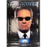 Two double-sided printed plastic cinema posters, one for Men In Black, 119 x 173cm together with a..
