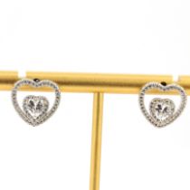 A pair of 925 silver heart shaped earrings set with cubic zirconia's, L. 1.5cm.