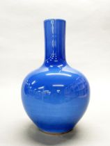 A fine Chinese pale blue glazed porcelain vase, H. 34cm. Six character mark to base, Kang Xi 1662-