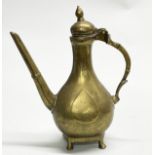 An 18th C Indian engraved brass coffee pot, H. 28cm.