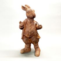 A cast iron Beatrix Potter garden figure, H. 37cm.