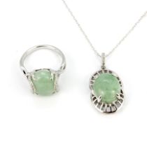 A 925 silver and jade pendant and chain, chain L. 40cm, together with a similar 925 silver and