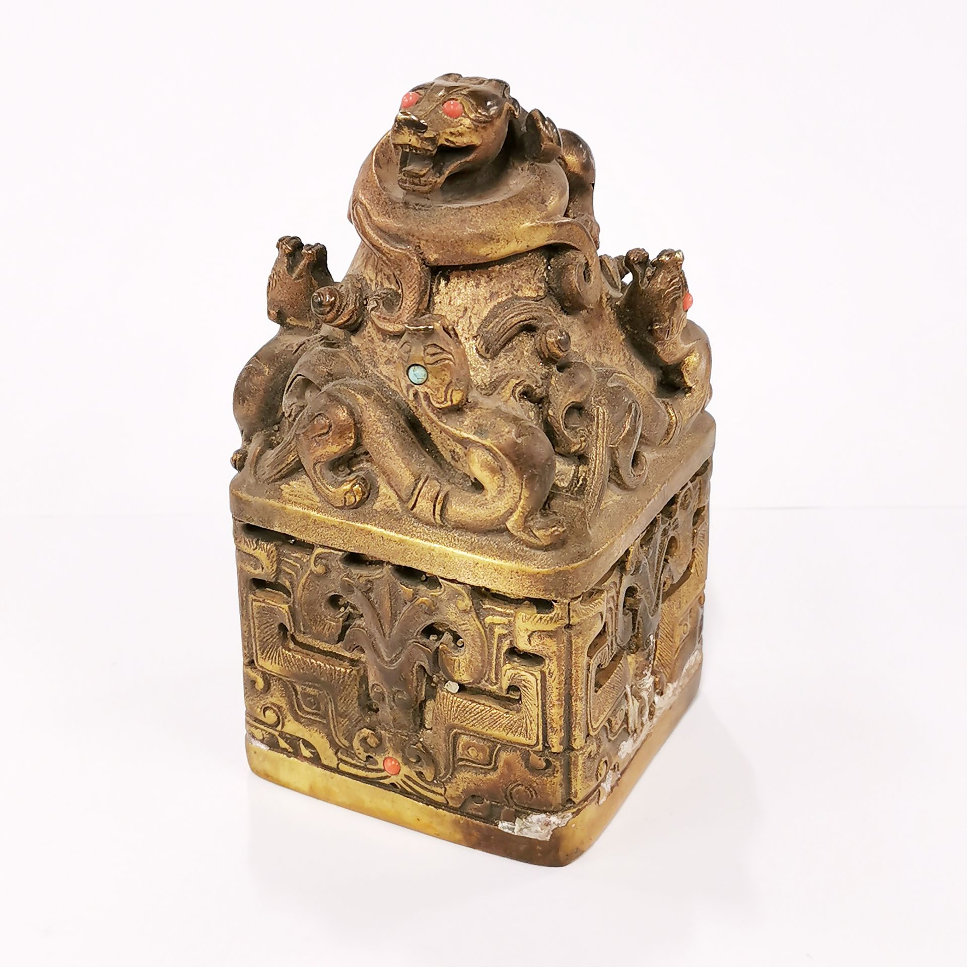 A Chinese gilt bronze scholar's seal with jewelled decoration, H. 17cm.
