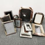 A quantity of silver plated photograph frames.