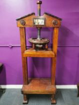 An impressive traditional wooden printing/ book binding press, 180 x 70 x 43cm.