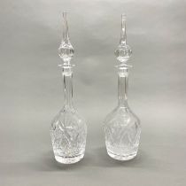 Two cut crystal glass decanters, H. 45cm.