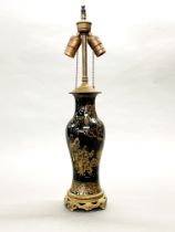 An early Chinese black glazed and gilt porcelain vase mounted c.1920 as a table lamp, overall H.