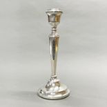 A large hallmarked silver candlestick, H. 32cm.