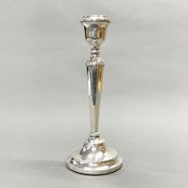 A large hallmarked silver candlestick, H. 32cm.