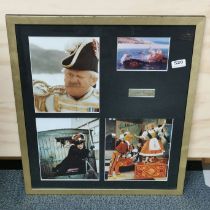 A framed group of photographs from Chitty Chitty Bang Bang, one signed by Dick Van Dyke, 53 x 62cm.
