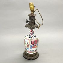 A 19thC Chinese Canton enamelled vase mounted as a table lamp, H. 47cm.