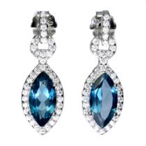 A pair of 925 silver drop earrings set with marquise cut London blue topaz and white stones, L. 2.