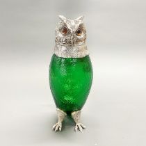 A silver plated and green glass owl water/wine jug with glass eyes. H. 28.5cm.