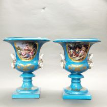A pair of large continental porcelain urns, H. 48cm, Dia. 39cm.