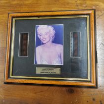 Two framed original film cells of Marylin Monroe, 30 x 25cm.