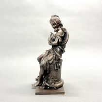 A bronze figure of a lady with birds, H. 29cm.