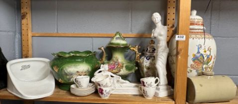 A group of mixed ceramic and other items.