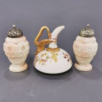 A Royal Worcester blush jug with a pair of Worcester sugar shakers, H. 11cm.