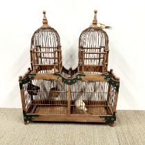 An ornamental painted bird cage, H. 65cm, W. 55cm.