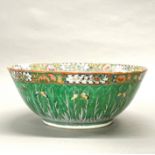 A large Chinese Canton enamelled porcelain bowl, Dia. 37cm, D. 15cm. Slight restoration.