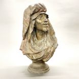 A large 19th C cast bronze/brass bust of an Arab with cold painted highlights, H. 56cm.