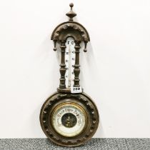 An early 20th C wall mounted barometer, L. 49cm.