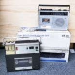 Two vintage portable music players and Eltax double cassette recorder.