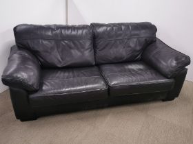 A pair of three seater leather sofas/ settees, L. 200cm D. 95cm.