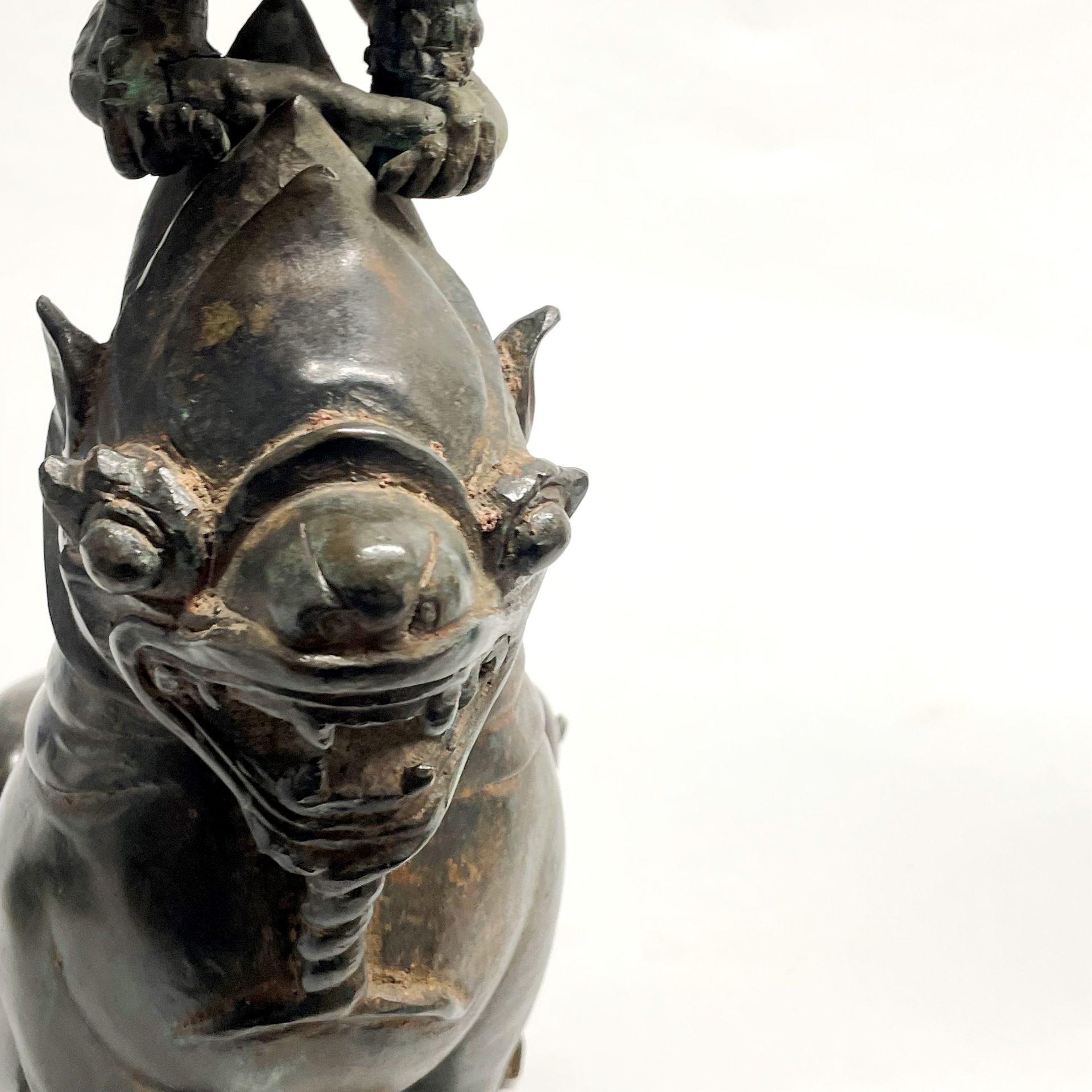 A pair of large Chinese bronze mythical animal pricket candlesticks featuring liondogs performing - Image 5 of 5