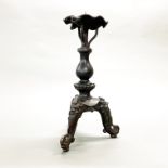 A 19th / early 20th C Chinese cast bronze pricket candlestick, H. 39cm.