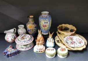A group of porcelain and enamelled items including Beswick Beatrix Potter figures.