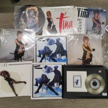 A mixed collection of Tina Turner memorabilia, largest frame 41.5 x 28.5cm.