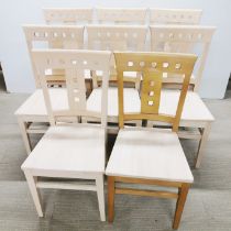 A set of eight handmade Italian beechwood dining chairs, seven raw beechwood, H. 93cm.