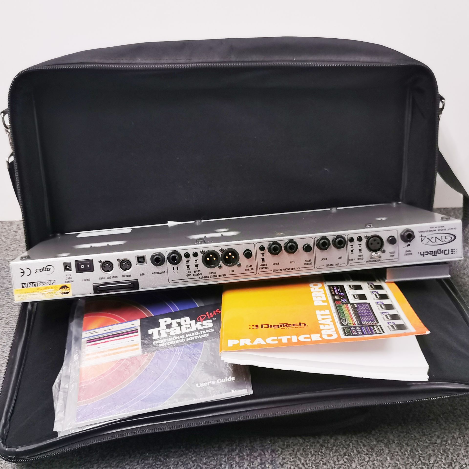 A cased Digitech GMX4 GeNetx guitar work station, 55 x 23cm, with various associated equipment and - Image 4 of 6