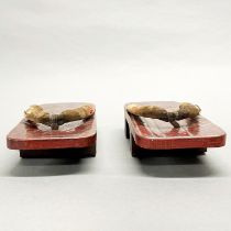 A pair of Japanese wooden raised shoes, L. 28cm.