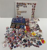 A large quantity of pin badges.