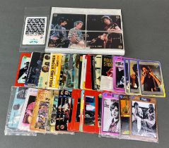 A quantity of Rolling Stones phone cards.