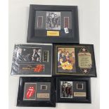 Five framed film cell pictures.