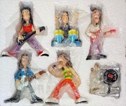 A set of 1980's boxed and sealed Rolling Stones figures.