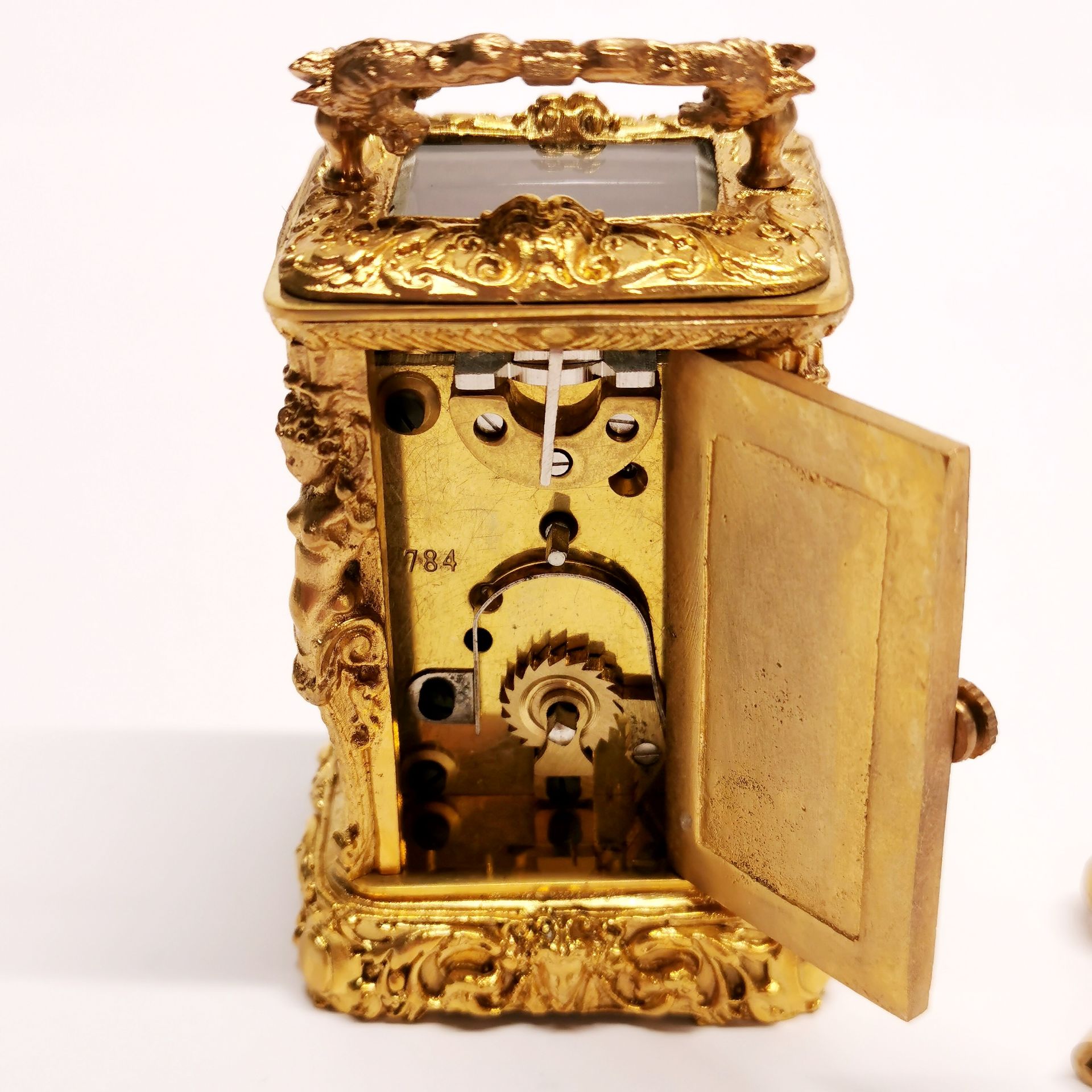 A miniature gilt brass carriage clock, H. 9cm. - Image 3 of 3