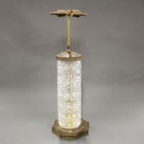 A large early 20thC cut crystal table lamp, H. 70cm.