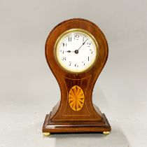 An Edwardian inlaid mahogany mantle clock, H. 23cm. Understood to be in working order.