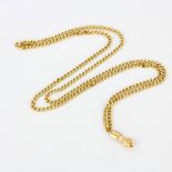 A heavy 18ct yellow gold chain and hand pendant, L. 72cm.