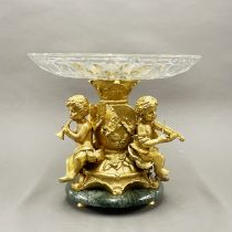 A large gilt bronze marble and glass cherub centrepiece, H. 28cm, Dia. 32cm.