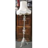 A painted 1920's wrought iron standard lamp with silk shade, overall H. 198cm.