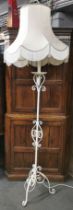 A painted 1920's wrought iron standard lamp with silk shade, overall H. 198cm.