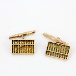 A pair of 14ct rose gold (stamped 14K) bamboo and abacus cufflinks, abacus L. 1.5cm.