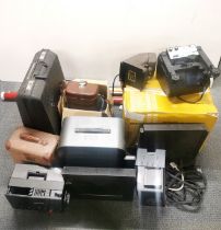 A quantity of photographic projectors and equipment.