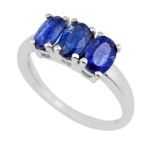 A 925 silver ring set with three oval cut sapphires, (N.5).